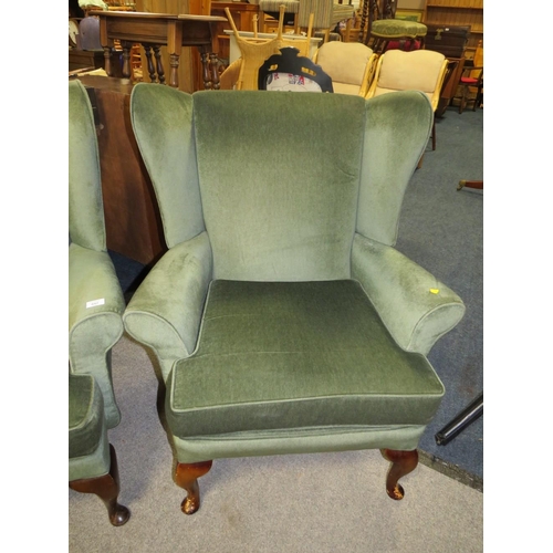 842 - A PAIR OF MODERN UPHOLSTERED WING ARMCHAIRS