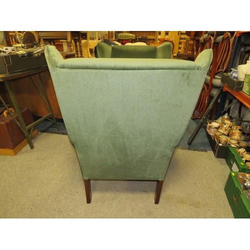 842 - A PAIR OF MODERN UPHOLSTERED WING ARMCHAIRS