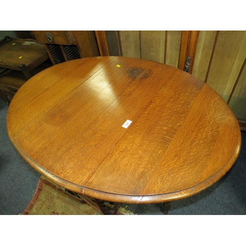 848 - AN OAK BARLEYTWIST DROPLEAF TABLE