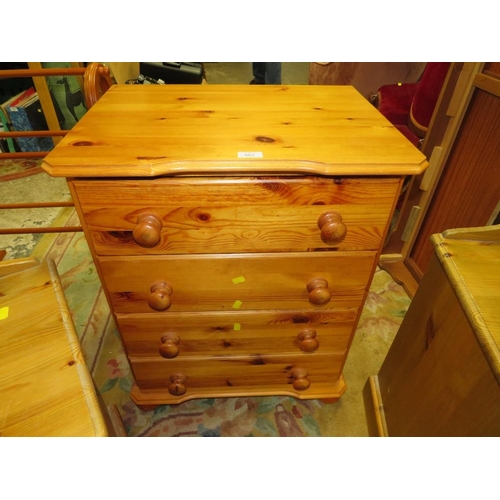 863 - A HONEY PINE FOUR DRAWER CHEST TOGETHER WITH BEDSIDES AND TOWEL RAIL