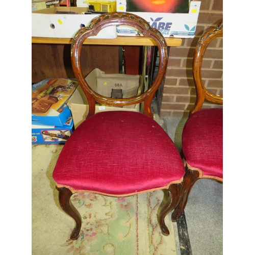 865 - A SET OF THREE MAHOGANY CARVED DINING CHAIRS