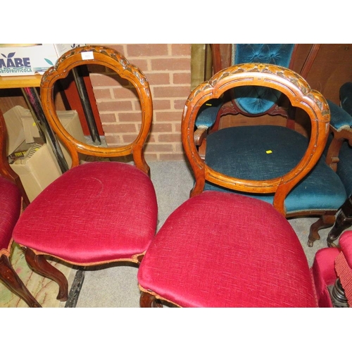 865 - A SET OF THREE MAHOGANY CARVED DINING CHAIRS