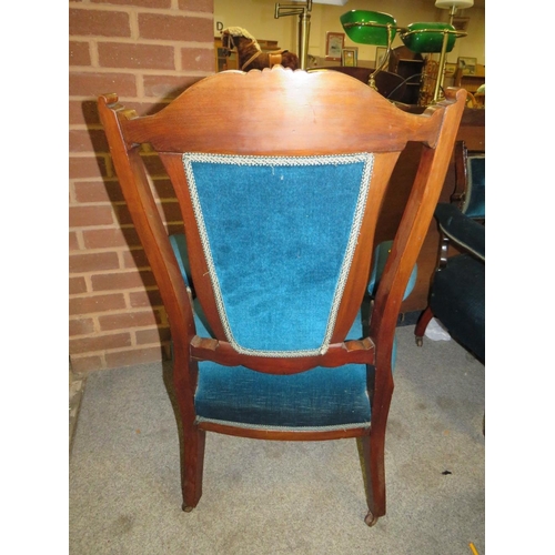 866 - AN EDWARDIAN MAHOGANY UPHOLSTERED ARM CHAIR