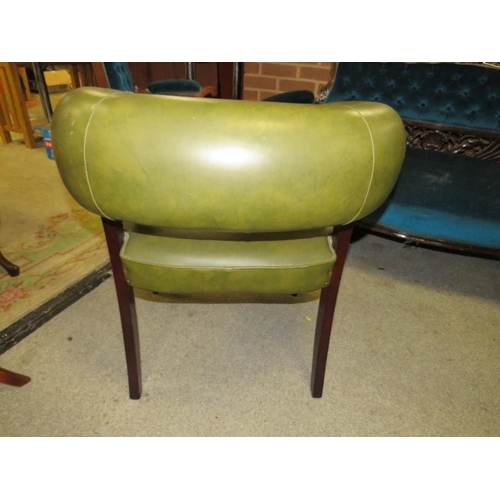 868 - A MODERN LEATHERETTE ARMCHAIR