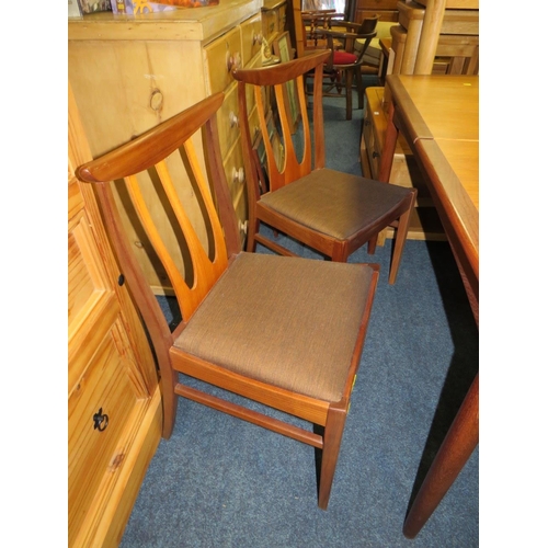 883 - A RETRO TEAK 'E GOMME' FOR G-PLAN EXTENDING DINING TABLE & FOUR CHAIRS