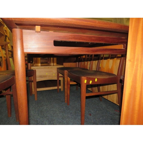 883 - A RETRO TEAK 'E GOMME' FOR G-PLAN EXTENDING DINING TABLE & FOUR CHAIRS