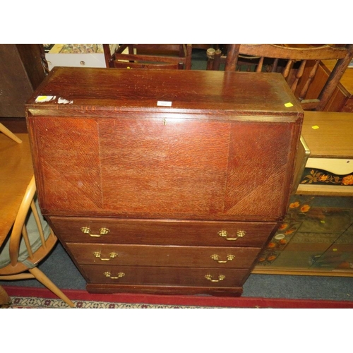 902 - A VINTAGE OAK BUREAU WITH BRASS CARRY HANDLES