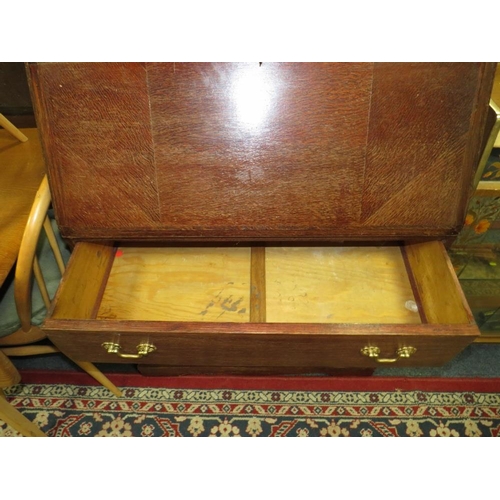 902 - A VINTAGE OAK BUREAU WITH BRASS CARRY HANDLES