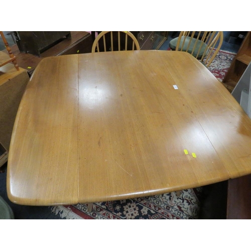 903 - AN ERCOL BLONDE DROPLEAF TABLE & FOUR HOOPBACK CHAIRS