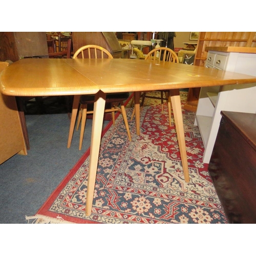 903 - AN ERCOL BLONDE DROPLEAF TABLE & FOUR HOOPBACK CHAIRS