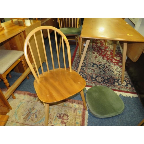 903 - AN ERCOL BLONDE DROPLEAF TABLE & FOUR HOOPBACK CHAIRS