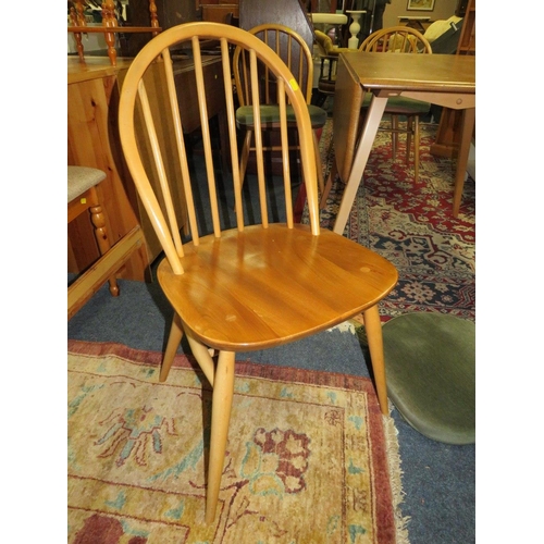 903 - AN ERCOL BLONDE DROPLEAF TABLE & FOUR HOOPBACK CHAIRS