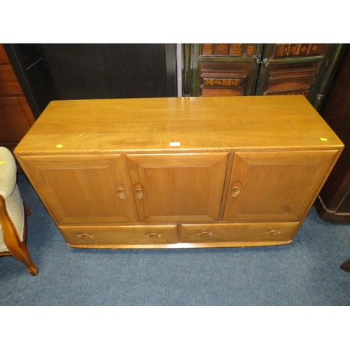 904 - AN ERCOL BLONDE SIDEBOARD - W 129 cm