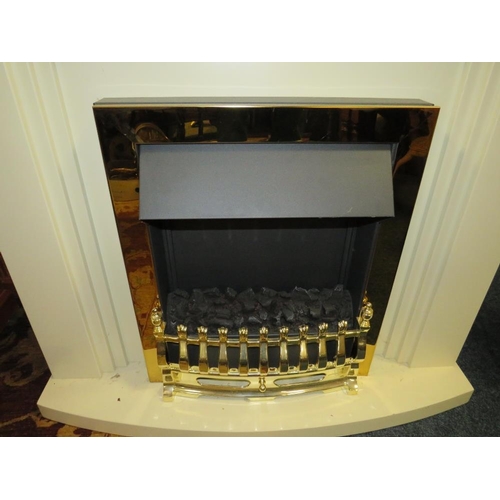 913 - A MODERN ELECTRIC FIRE IN A CREAM SURROUND