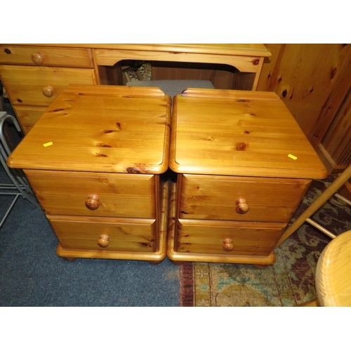 916 - A HONEY PINE DRESSING TABLE, MIRROR, THREE STOOLS, A PAIR OF BEDSIDE CHESTS AND A WOT-NOT