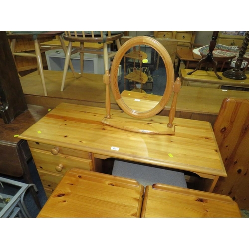 916 - A HONEY PINE DRESSING TABLE, MIRROR, THREE STOOLS, A PAIR OF BEDSIDE CHESTS AND A WOT-NOT