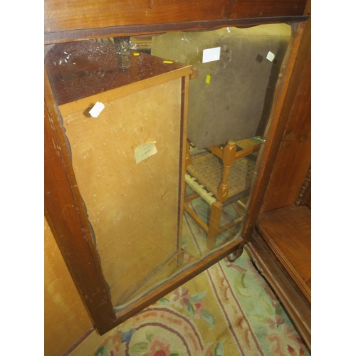 927 - A VINTAGE GLAZED TWO DOOR BOOKCASE