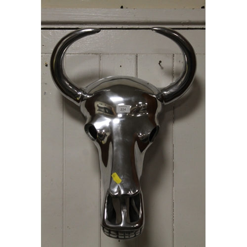 224 - A LARGE CHROME EFFECT CAST METAL MODEL OF A COW SKULL