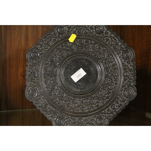 240 - AN EBONISED STYLE ORNATE JARDINIAIRE STAND