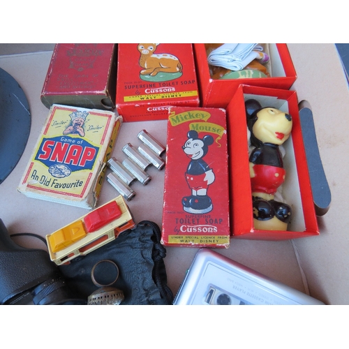 398 - A TRAY OF COLLECTABLES TO INCLUDE VINTAGE NATO HELMET, BINOCULARS, VINTAGE PLAYING CARDS, BAMBI & MI... 