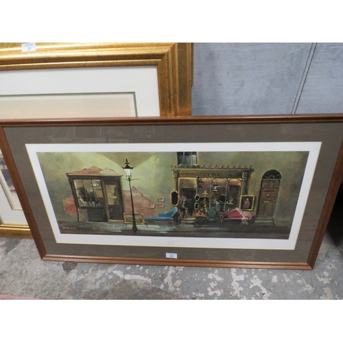 24 - A FRAMED AND GLAZED PRINT ENTITLED ANTIQUE SHOP BY DEBORAH JONES