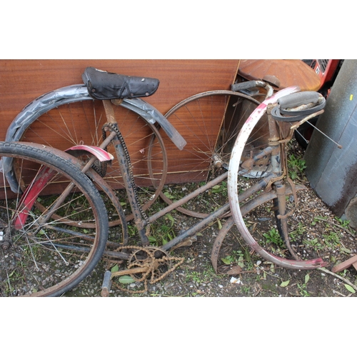 608 - A VINTAGE BICYCLE TOGETHER WITH A COLLECTION OF SPARES