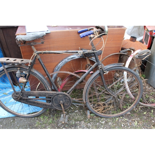 608 - A VINTAGE BICYCLE TOGETHER WITH A COLLECTION OF SPARES