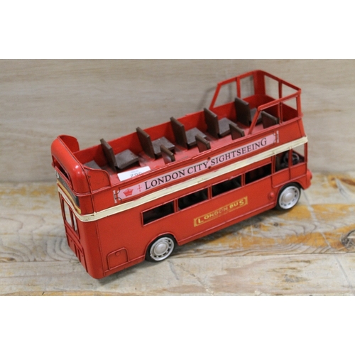 382 - A TIN PLATE LONDON SIGHTSEEING BUS - L 30 cm, H 16 cm