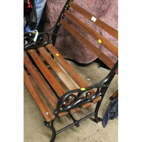 669 - A SMALL MODERN GARDEN BENCH