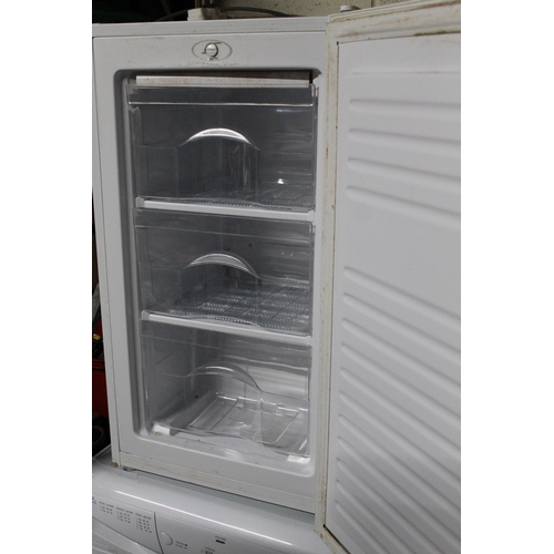 674 - AN UNDER COUNTER FREEZER - SLIGHT DAMAGE TO CASE