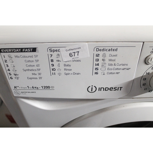 677 - AN INDESIT WASHING MACHINE