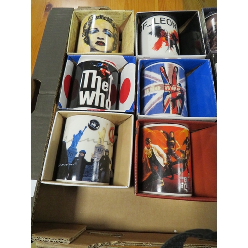 72 - A TRAY CONTAINING 12 NEW BOXED POP MUSIC RELATED MUGS TO INCLUDE THE WHO x 2, MADONNA, KINGS OF LEON... 