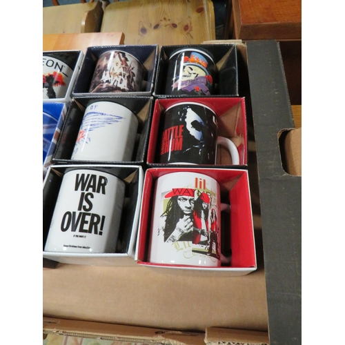 72 - A TRAY CONTAINING 12 NEW BOXED POP MUSIC RELATED MUGS TO INCLUDE THE WHO x 2, MADONNA, KINGS OF LEON... 