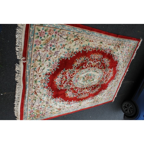 929 - A LARGE CHINESE WOOLLEN RUG