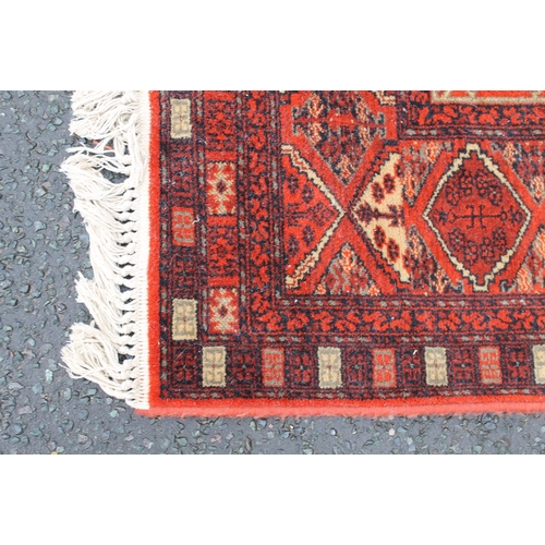 930 - TWO EASTERN WOOLLEN RUGS