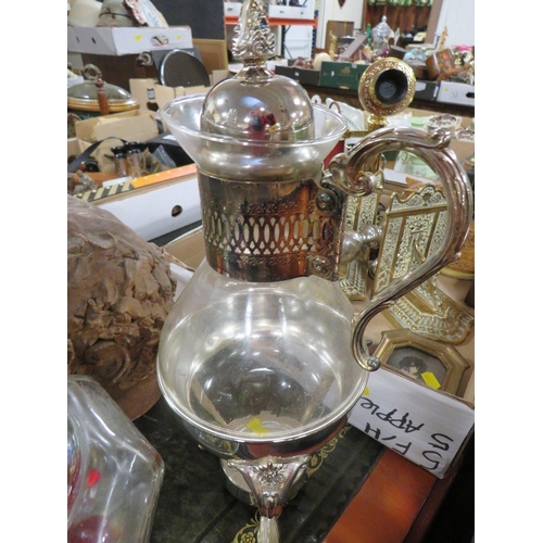 135 - A UNUSUAL BRASS STYLE OIL LAMP TOGETHER WITH A SILVER PLATED DECANTER AND STAND