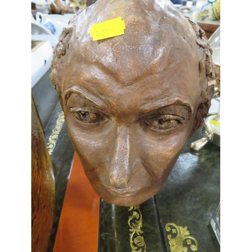 137 - A CLAY MODEL OF A GENTLEMANS HEAD