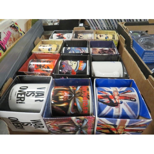 158 - A TRAY OF TWELVE NEW BOXED POP MUSIC RELATED MUGS TO INCLUDE THE WHO, IRON MAIDEN, KINGS OF LEON, CO... 