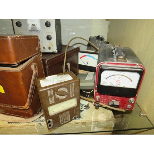 627 - A SHELF CONTAINING VARIOUS AVO METERS AND OTHER ELECTRCIAL TESTERS