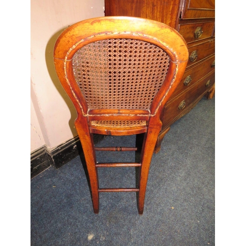 821 - A CHILDS ANTIQUE BERGERE HIGH CHAIR