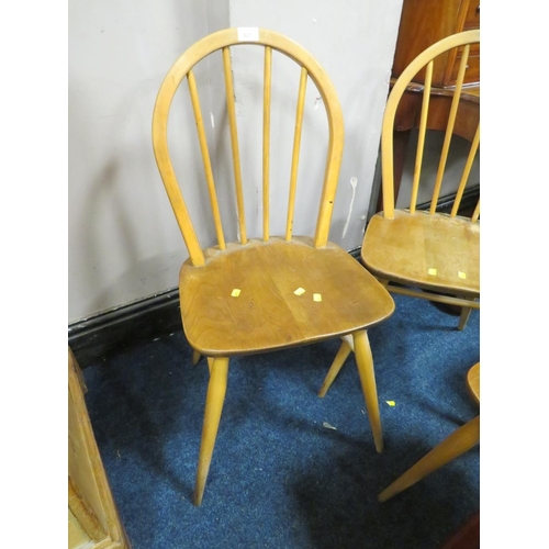 827 - A SET OF FOUR ERCOL STYLE HOOP BACK CHAIRS