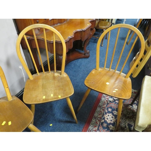 827 - A SET OF FOUR ERCOL STYLE HOOP BACK CHAIRS