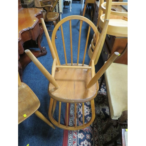 827 - A SET OF FOUR ERCOL STYLE HOOP BACK CHAIRS