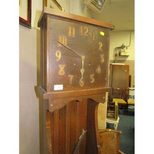 830 - AN UNUSUAL ARTS AND CRAFTS STYLE TALL CLOCK - H 185 cm (PENDULUM)