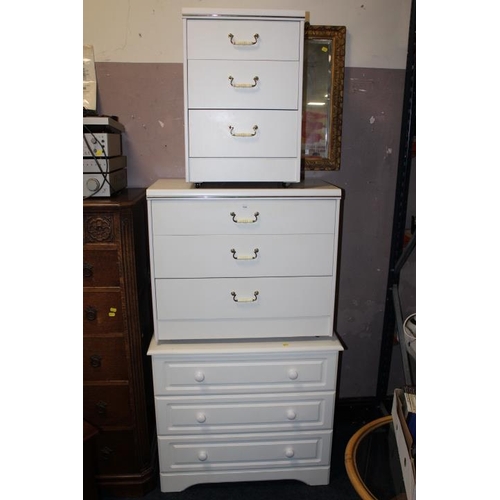 844 - THREE WHITE BEDROOM CHESTS, A TV UNIT PLUS A WICKER TABLE