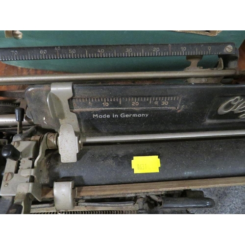 229 - A VINTAGE JONES SEWING MACHINE TOGETHER WITH A VINTAGE OLYMPIA BUROMASCHINENWERKE A.G. ERFURT MOD 8 ... 