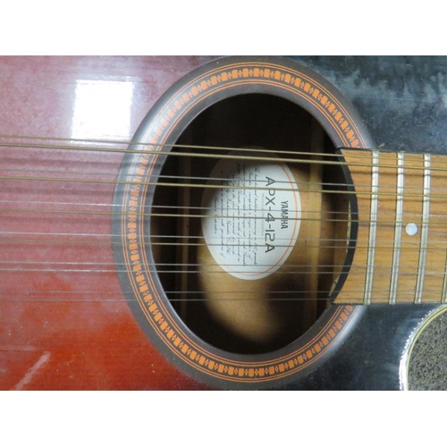 234 - A YAMAHA TWELVE STRING ACOUSTIC GUITAR