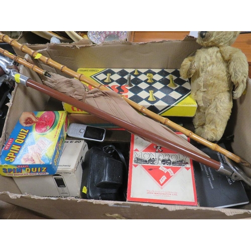 79 - A TRAY OF VINTAGE BOARD GAMES , CAMERA EQUIPMENT SHOOTING STICK ETC