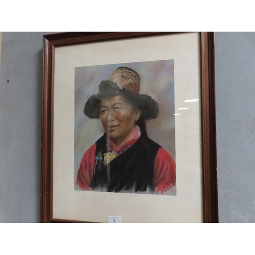 9 - A FRAMED AND GLAZED PASTEL STUDY OF TIBETAN WOMAN BY J A HULBERT