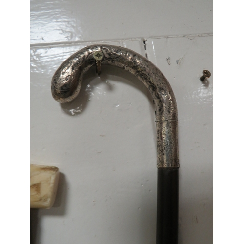 254 - A HALLMARKED SILVER TOPPED WALKING CANE TOGETHER WITH A HALLMARKED SILVER BANDED BONE HANDLED EXAMPL... 